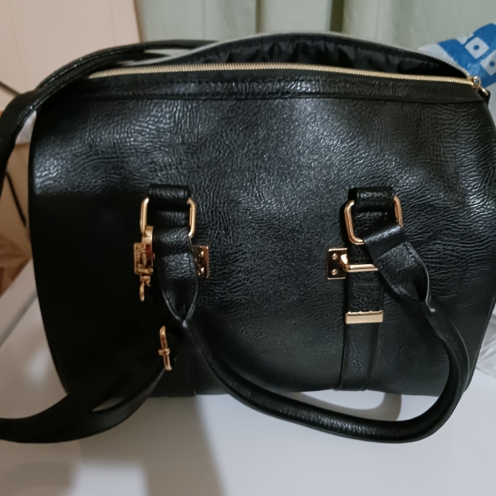 Satchel black brand is Attention
